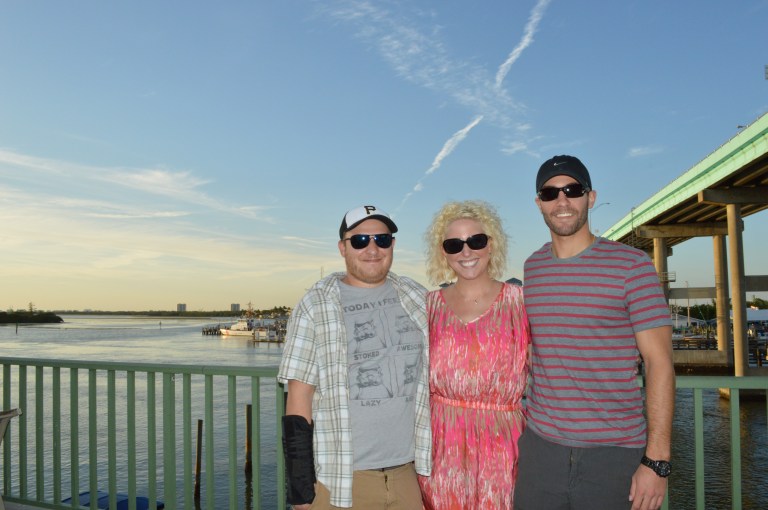 Here is Sean, his sister and her husband posing from the top deck at Nervous Nellies. 